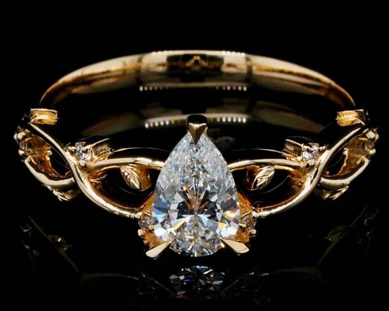 Pierścionek zaręczynowy z diamentem gruszka 0,60 ct – złoto 585
