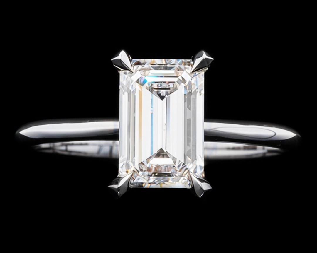 Pierścionek z diamentem w szlifie szmaragdowym 1.5 ct
